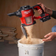 Illustration for article titled Milwaukee Made a Handheld Dustbuster That Won't Choke on Workshop Debris